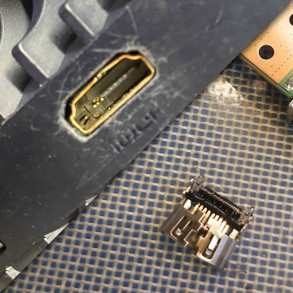 A damaged HDMI port taken off a console board